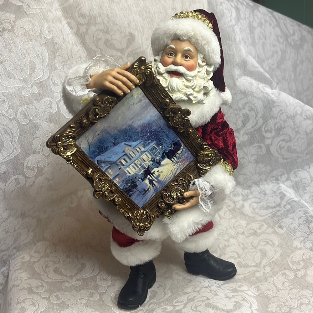 Kurt Adler Santa Holding a Thomas Kinkade Winter Scene Picture Rare.
